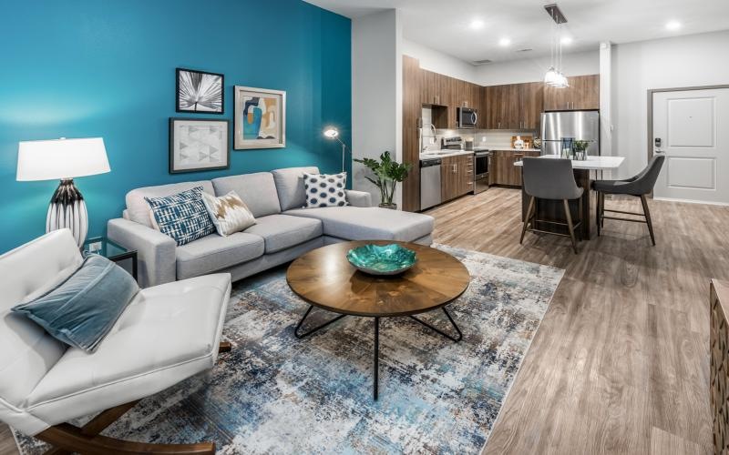 a living room with a couch and a table