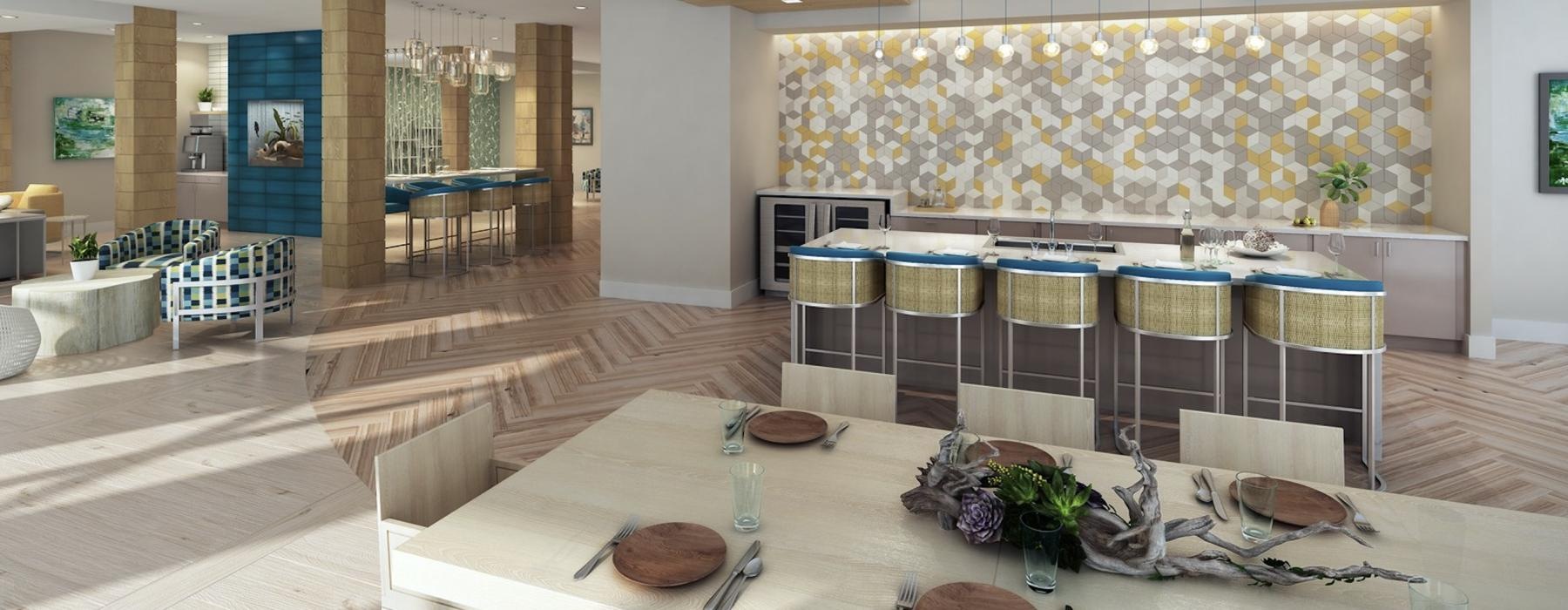 clubroom with kitchen and dining table