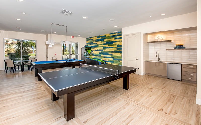 game room with ping pong and billiards
