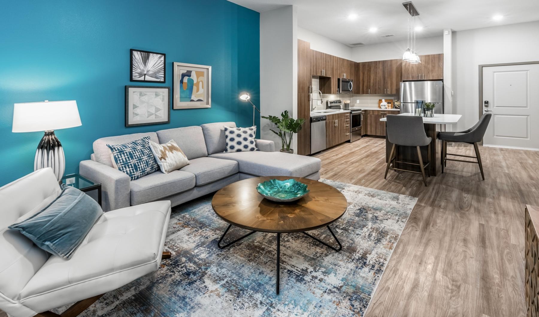 a living room with a couch and a table