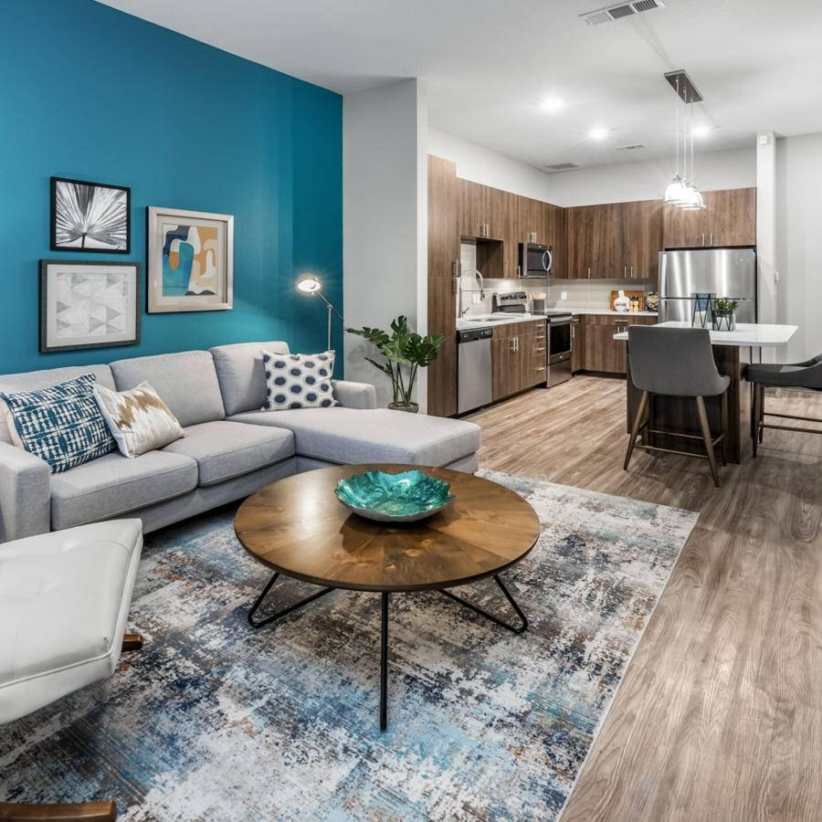 a living room with a couch and a table