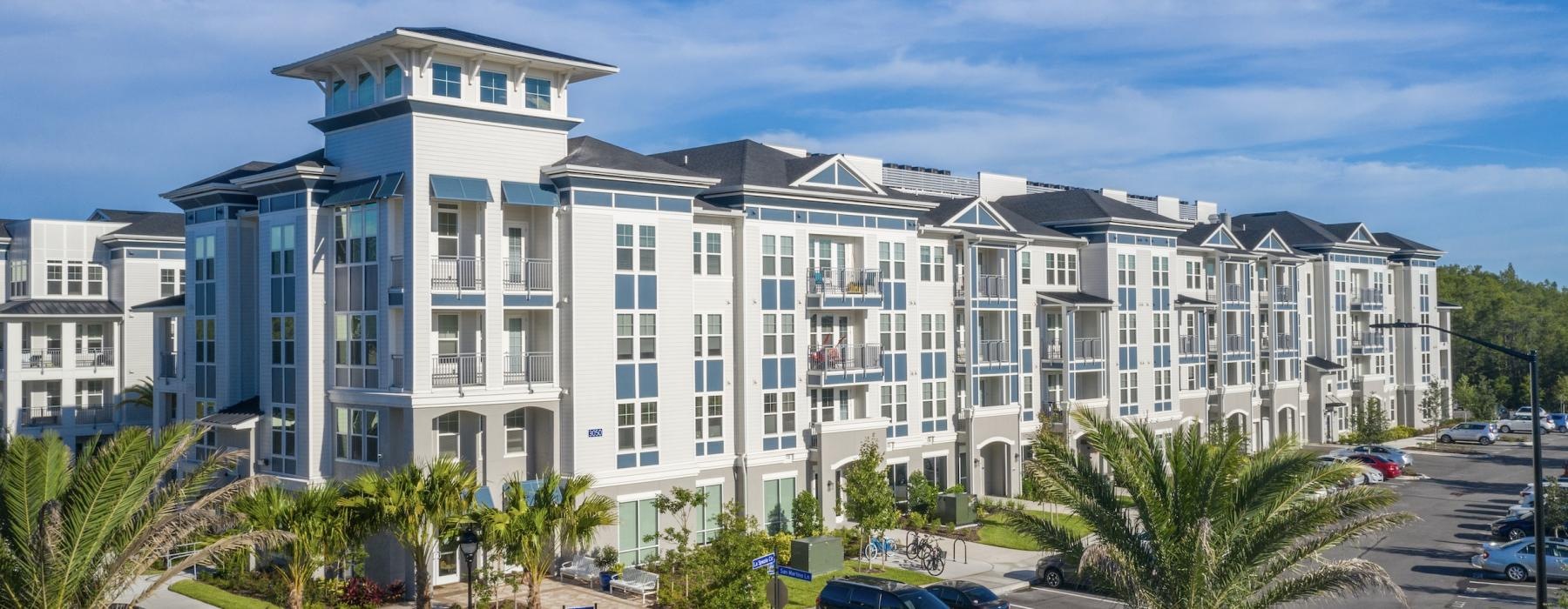 a building with cars parked in front