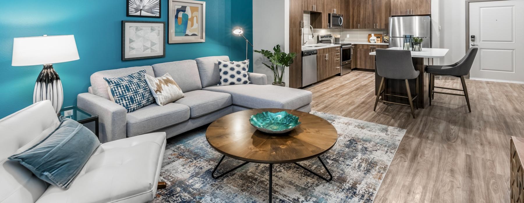 a living room with a couch and a table